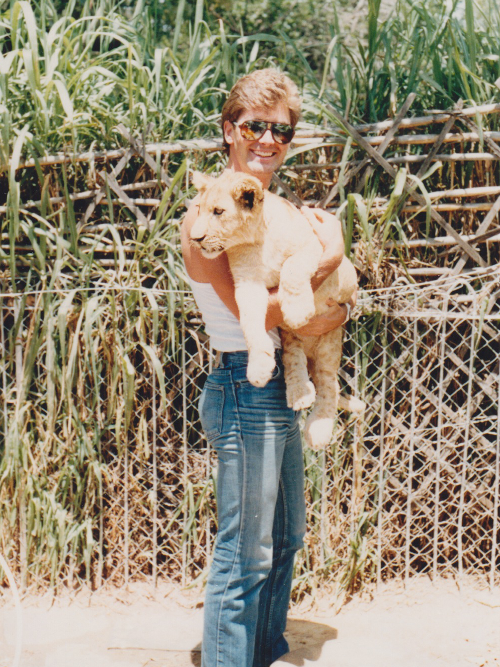 Rob Seiler with lion cub